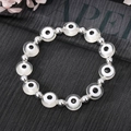 Détail du bracelet Evil Eye avec perles en acrylique blanc et entretoises argentées - Blanc Transparent