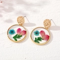Vintage round resin stud earrings with real dried flowers and gold metal framing - Blue Flower Petals