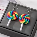 Colorful rainbow lollipop drop earrings with clay spiral design on dark jewelry box - Rainbow Lollipop