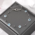 Macro shot of silver chain bracelet with evil eye beads and adjustable lobster clasp - Silver Bead Bracelet with White and Blue Eye (5#)