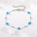 Silver evil eye pearl bracelet for women featuring light blue beads on a white stone background - Sky Blue Eye Silver Chain Bracelet (Style 1)
