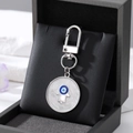 Hamsa Hand and Evil Eye keychain with marble texture in a premium gift box setup - Silver Palm