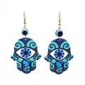 Close-up of bohemian Hamsa Hand earrings with blue swirl patterns and evil eye motif - Big Eye Flower Pattern