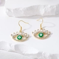 Vintage Turkse boze oog oorbellen met groen emaille en sprankelende strassteentjes - Groene Wimpers Oog