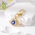 Portachiavi occhio del malocchio dorato con strass e smalto blu su base in pietra - Occhio Blu Scuro