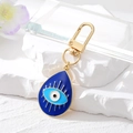 Vintage Wassertropfen-Schlüsselanhänger Auge des Bösen aus Goldlegierung mit Emaille - Blau Wassertropfen Auge