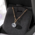 Golden necklace with Turkish Evil Eye bead pendant displayed in velvet jewelry box - White (Transparent)