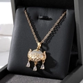 Vintage ketting met langlevend slot, roze steen en kwastjeshanger in goudkleur - Wit