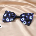 Detalle de pinza para el pelo con lazo de tela y patrón de ojo turco sobre seda - Negro Azul Ojo Redondo