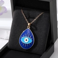 Golden Evil Eye teardrop necklace with blue enamel pendant in a black gift jewelry box - Gold Blue Water Drop Eye
