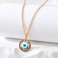 Detailed macro view of Evil Eye pendant necklace with marble texture on white display stand - Small Round Eye / Black