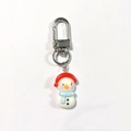 Cute resin snowman keychain with red hat and blue scarf on a metallic silver ring - Snowman with Yellow Nose