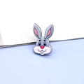 Detailed close-up of a cute gray rabbit acrylic brooch pin with big blue eyes and pink ears - Grey Rabbit