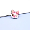 Close-up of a cute resin pink cartoon cat brooch with glossy finish and vibrant details - Pink Cat