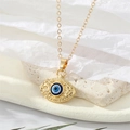 Gouden Turkse Evil Eye hanger ketting met geometrische gravure op een stenen basis - Gouden Holle Oogstijl
