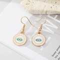 Vintage gouden Evil Eye oorbellen met kleurrijke emaille bedels op witte stenen basis - Witte Zonnestraal Boze Oog