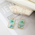 Handmade rectangular drop earrings with blue dried flowers, gold foil, and pearls - Lake Blue Flower (With Pearl)
