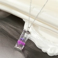 Daisy wish bottle necklace with purple dried flowers in a cylindrical glass pendant - Purple