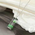 Handmade green dried flower wishing bottle pendant necklace with silver chain on silk - Green