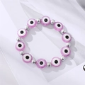 Bracelet rétro œil du mal avec perles en résine violette et petites boules argentées - Perles Argentées Œil Violet