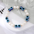 Bracelet fait main avec perles en verre œil bleu et perles blanches pour femmes - Oeil Bleu Avec 2 Perles
