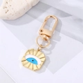 Golden Evil Eye heart keychain with blue enamel inlay and durable lobster clasp - Square Enamel Eye