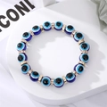 Bracelet perles œil grec fait main avec perles bleues foncées et accents dorés - Bracelet Strass Oeil Bleu