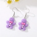 Boucles d'oreilles bonhomme de pain d'épices violet avec nœud rose mignon - Bonhomme de Pain d'Épice Violet