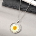 Handmade clear resin pendant necklace featuring a real white daisy flower and silver chain - Small White Flower