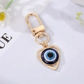 Golden heart keychain with blue evil eye bead and U-shaped lobster clasp accessory - Gold Heart Eye Charm