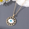 Golden Evil Eye pendant necklace with sparkling rhinestones and blue enamel eye detail - White