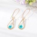 Handmade teardrop earrings with real blue dried flowers and gold foil in resin - Blue