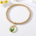 Bracciale minimalista con perline dorate e ciondolo rotondo con fiori secchi gialli - Stile Fiore Giallo Foglia Verde