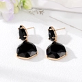 Close-up of geometric fan-shaped earrings with black crystal stones and gold plating - Black