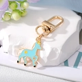 Portachiavi con unicorno azzurro, chiusura in metallo dorato e dettaglio stella - Unicorno Blu