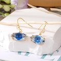 Pendientes de ojo turco chapados en oro con cristales azules y circonitas brillantes - Ojo Azul
