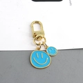 Llavero de carita sonriente azul en esmalte con colgante doble y cierre de oro - Azul Doble Sonrisa