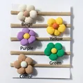 Cinque fasce elastiche a fiori in velluto a coste nei colori beige, giallo, viola, verde e marrone - Colori Misti