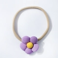 Detail of purple corduroy flower decoration on yellow elastic baby headband - Purple