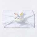 Close-up of white soft knit baby headband with 3D plush bunny and embroidery - White