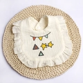 Soft cream cotton muslin baby bib with ruffled edges and colorful star patterns - Beige Star