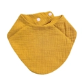 Macro detail of ginger cotton muslin baby bib showing soft crinkle texture and snap buttons - Earthy Yellow