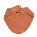 Detail of the breathable muslin cotton texture and adjustable white resin snaps on baby bib - Orange