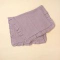 Close-up of soft purple muslin cotton baby bib with decorative ruffled edge texture - Taro Purple