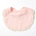 Pink cotton gauze baby bib featuring delicate lace edges and snap button closure - Pink