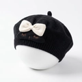 Detail of baby bunny beret featuring soft knit texture with cute ears and bow accent - Black