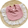Detailed view of pink waffle cotton baby bib with white floral lace and resin snap button - Taro Purple
