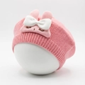 Pink knit baby beret with a large white bow, bunny ears, and cute embroidered details - Dust Rose