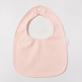 Detail view of pink waterproof cotton baby bib with TPU layer and adjustable snaps - Nude Pink