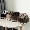 Detailed close-up showing four different faux fur leopard print winter hats for babies - 4 Color Mixed Style